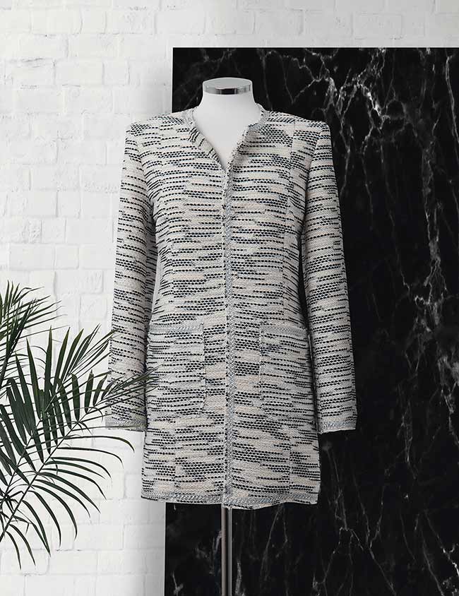 Chaqueta de mujer corte estilo Chanel en tejido de algodón tramado. Sastrería Brune.